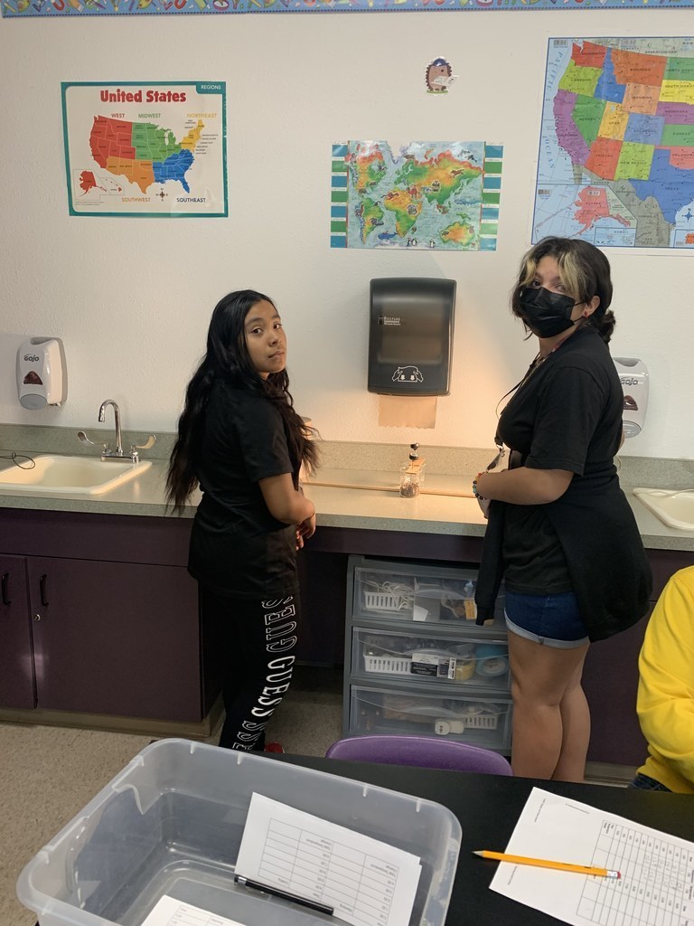 Mrs. Huntress students are in the first science lab of the year.