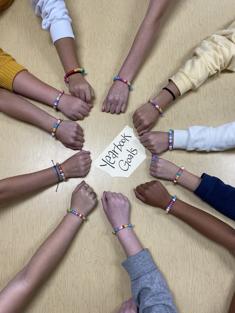 Students in Yearbook are creating goal bracelets. Each bead represents a goal.