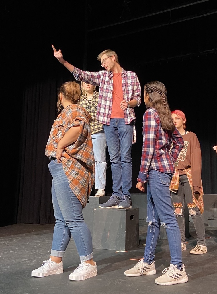 Theatre performance at PAC, 5 people performing.