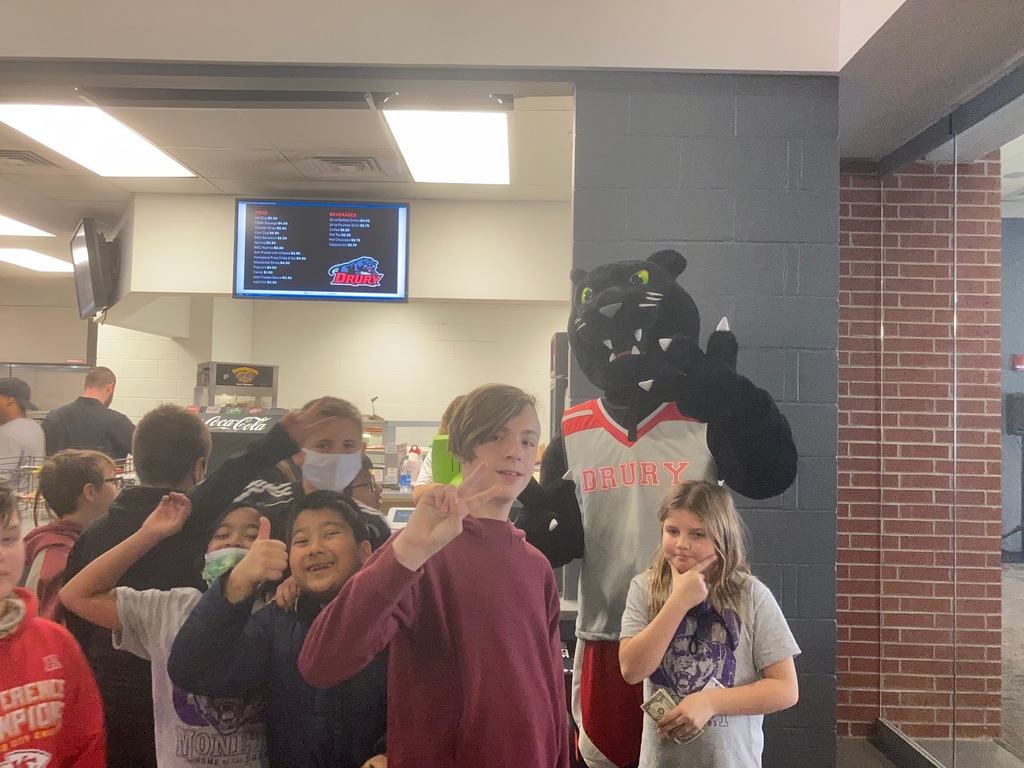 MIS Students take a photo with the Drury University Mascot. 