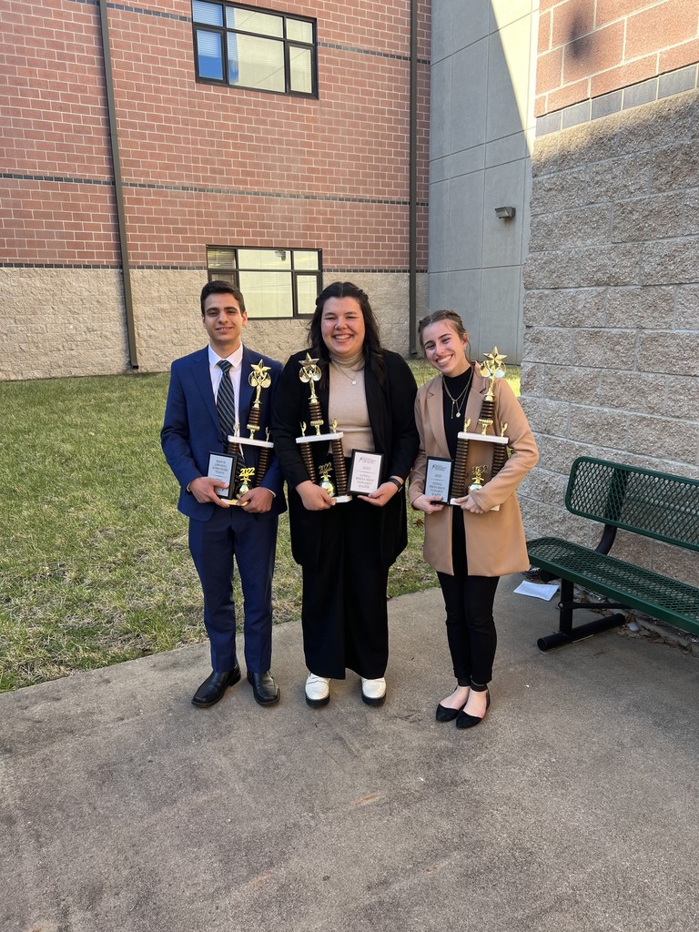 Anna Kruger and Abby Apostol ,Pete Masri- Original Oratory, standing and holding trophies 