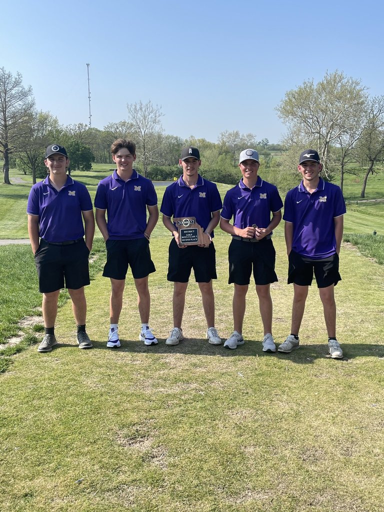 four high school males, wearing purple and gold, holding the MSHSAA 2022 district golf boys class 3 second place plaque. 